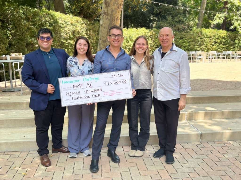 Sophia Cha and FAST AI team with Innovation Challenge check